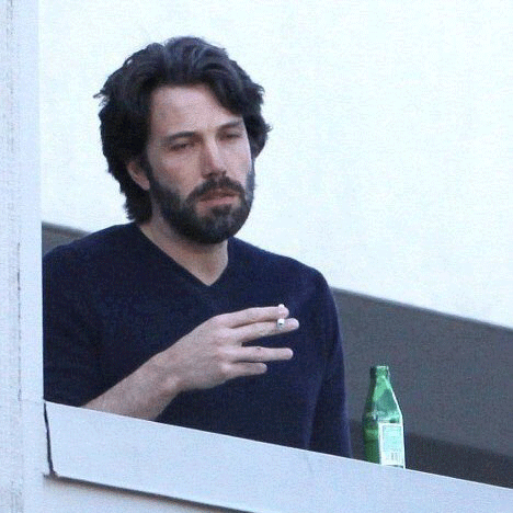meme of Ben Affleck with an exhausted look holding a cigarette